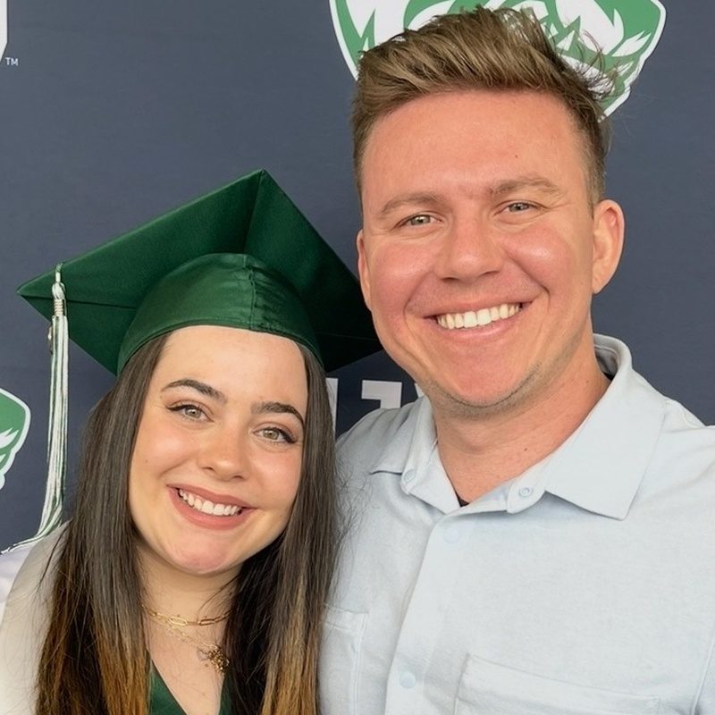 Zack McGonigle with his wife at their UVU graduation